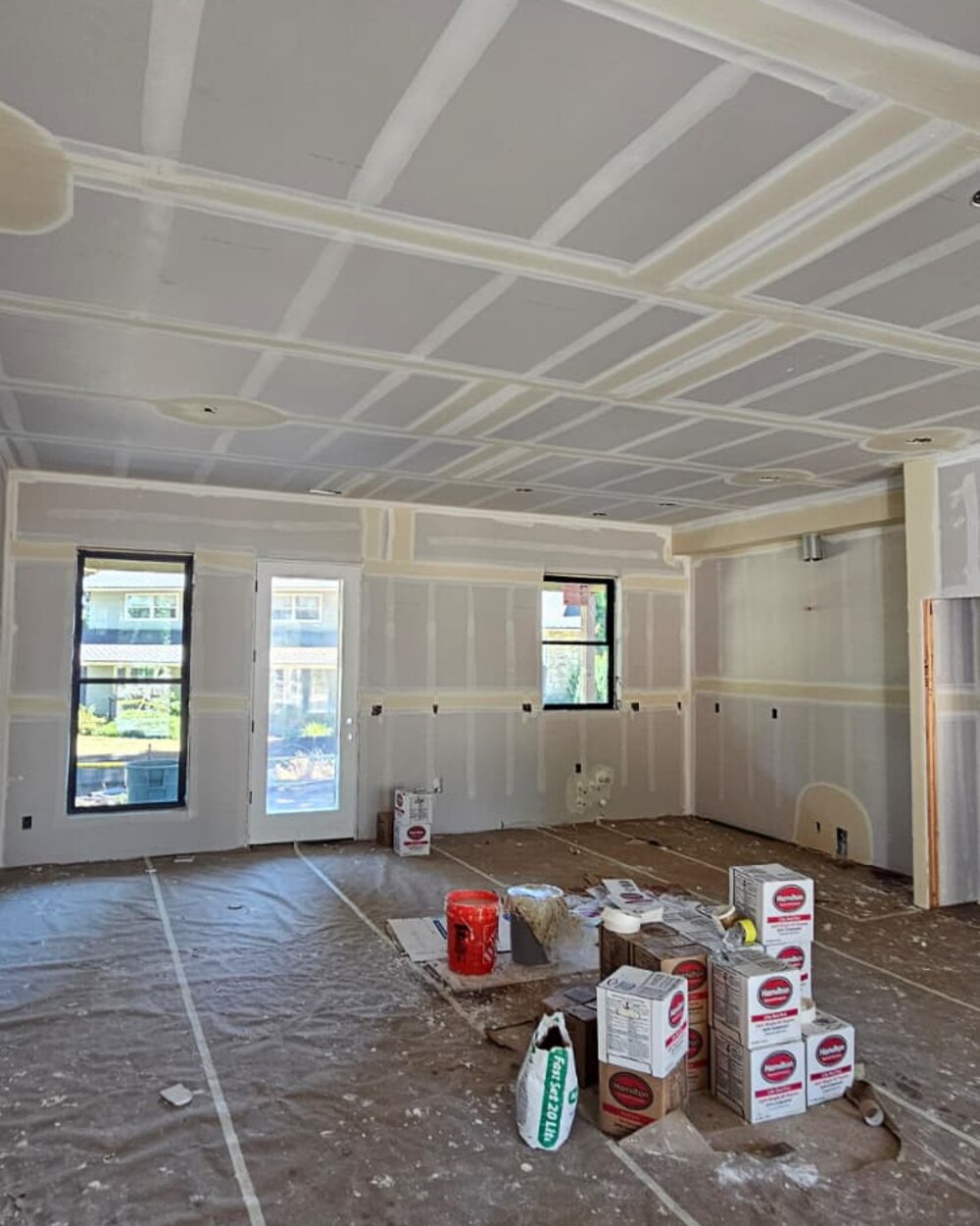 Drywall with taped and mudded seams